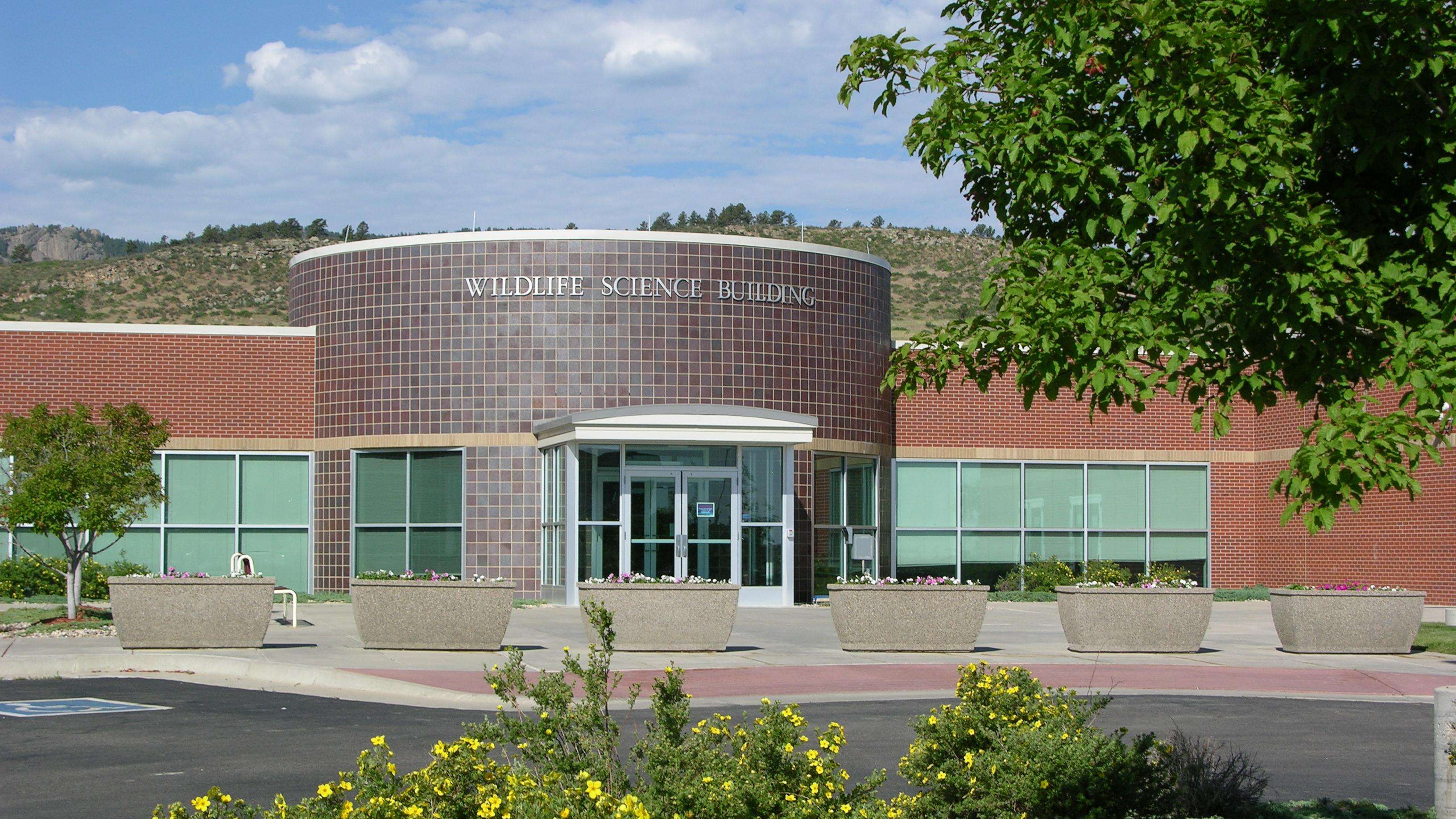 image showing the National Wildlife Research Center's Wildlife Science Building, view of front entrance on a sunny day