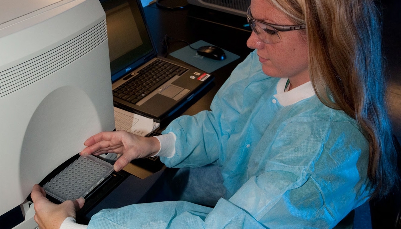 aphis-impact-2024 APHIS employee working in a lab