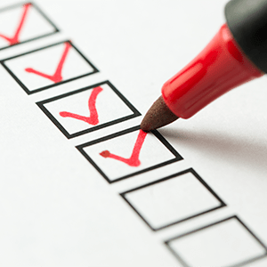 A column of checkboxes with three red checkmarks